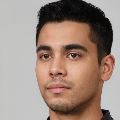 Neutral latino young-adult male with short  black hair and brown eyes