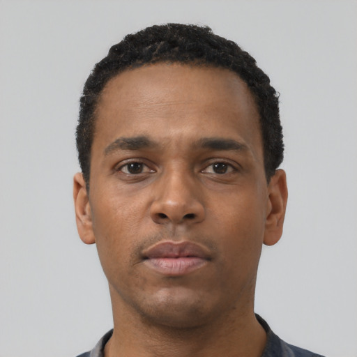Neutral black young-adult male with short  black hair and brown eyes
