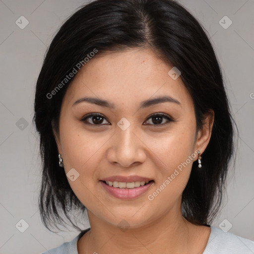 Joyful asian young-adult female with medium  black hair and brown eyes