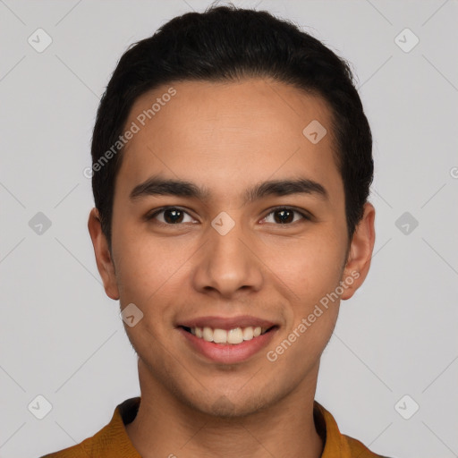 Joyful white young-adult male with short  black hair and brown eyes