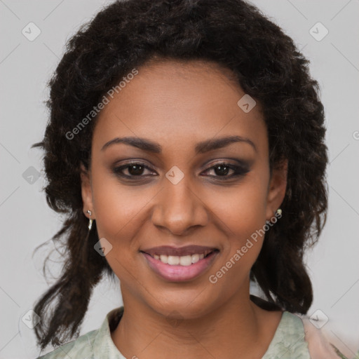 Joyful black young-adult female with medium  brown hair and brown eyes