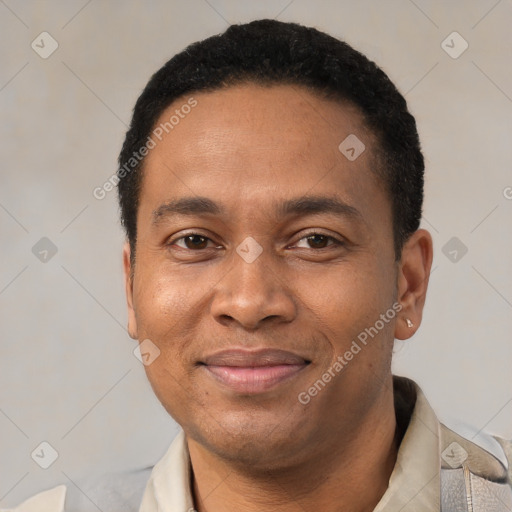 Joyful latino adult male with short  black hair and brown eyes