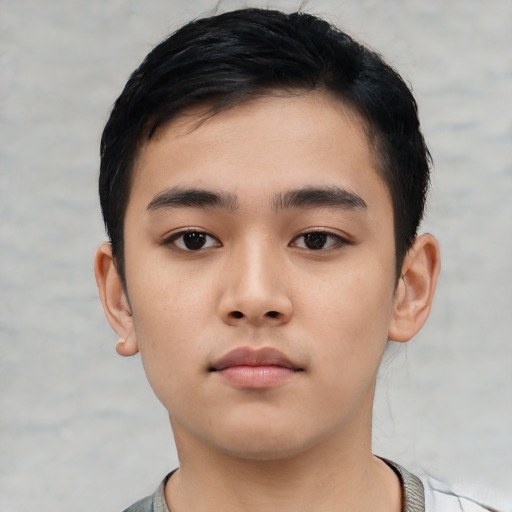 Neutral asian child male with short  black hair and brown eyes
