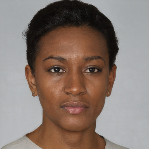 Neutral black young-adult female with short  black hair and brown eyes