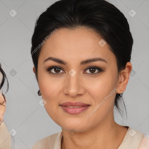 Joyful latino young-adult female with medium  brown hair and brown eyes