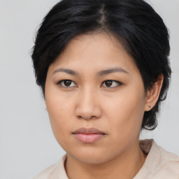 Neutral asian young-adult female with medium  brown hair and brown eyes