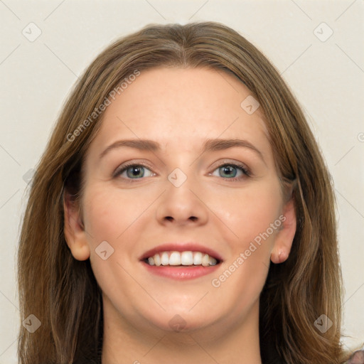 Joyful white young-adult female with long  brown hair and green eyes