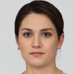 Neutral white young-adult female with short  brown hair and brown eyes