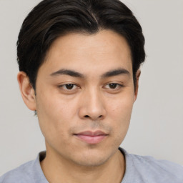 Neutral asian young-adult male with short  brown hair and brown eyes