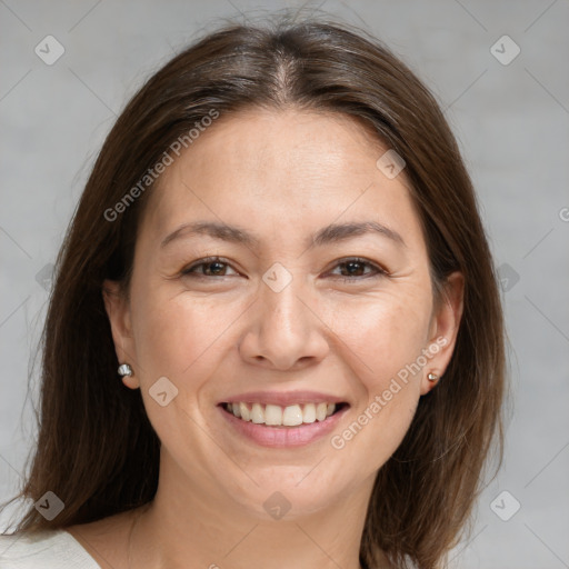 Joyful white adult female with medium  brown hair and brown eyes