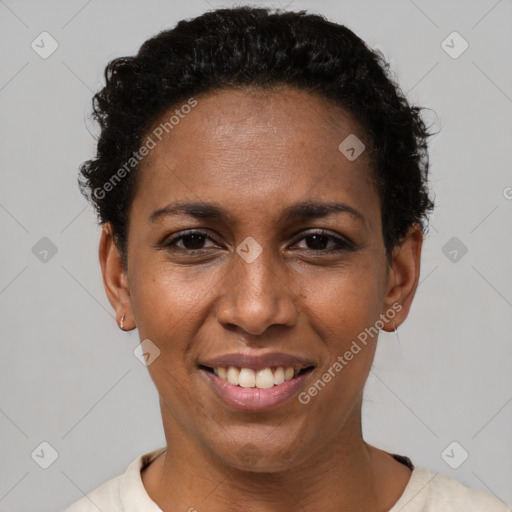 Joyful latino young-adult female with short  black hair and brown eyes