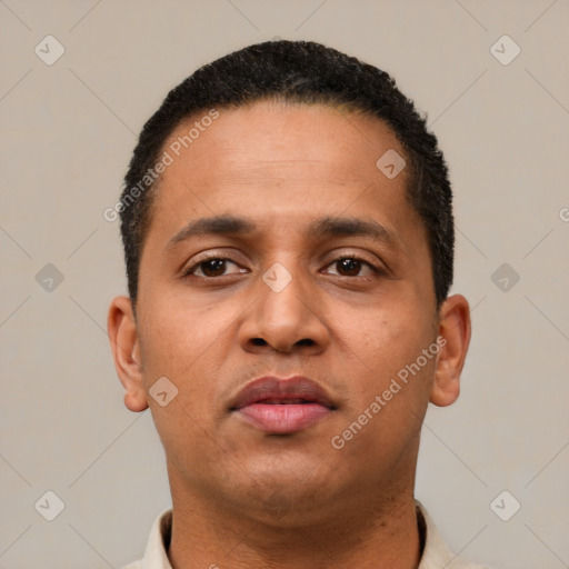 Neutral latino young-adult male with short  brown hair and brown eyes
