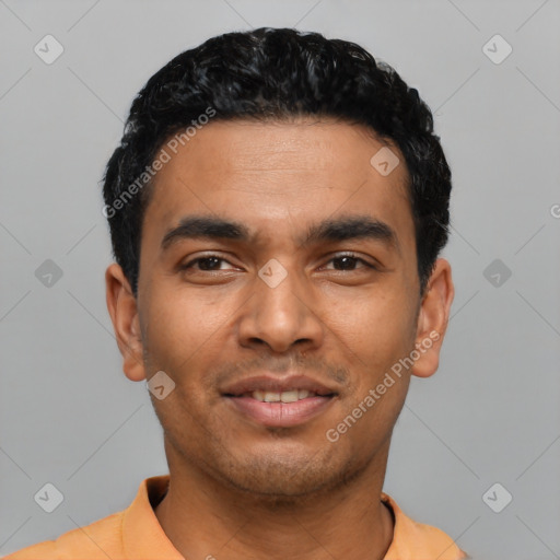 Joyful latino young-adult male with short  black hair and brown eyes