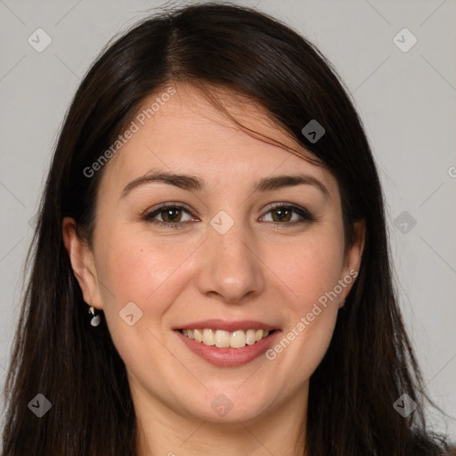 Joyful white young-adult female with long  brown hair and brown eyes