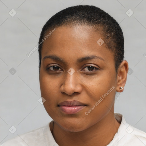 Joyful black young-adult female with short  brown hair and brown eyes