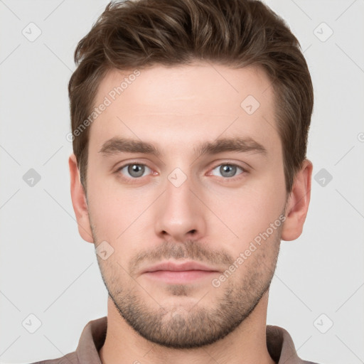 Neutral white young-adult male with short  brown hair and grey eyes