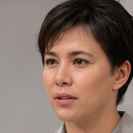 Neutral white young-adult female with medium  brown hair and brown eyes