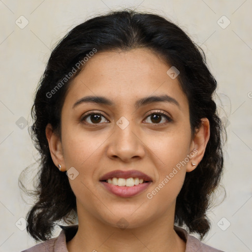 Joyful latino young-adult female with medium  brown hair and brown eyes