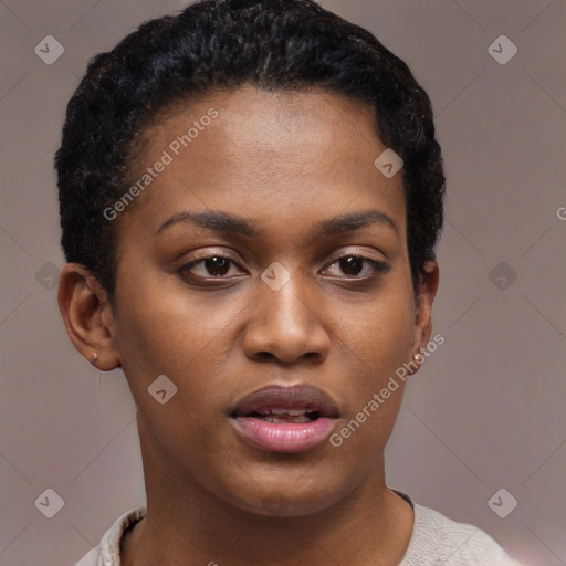 Joyful black young-adult female with short  brown hair and brown eyes