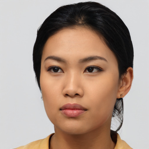 Neutral asian young-adult female with medium  black hair and brown eyes
