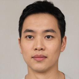 Neutral asian young-adult male with short  black hair and brown eyes