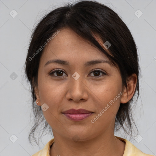 Joyful asian young-adult female with medium  brown hair and brown eyes