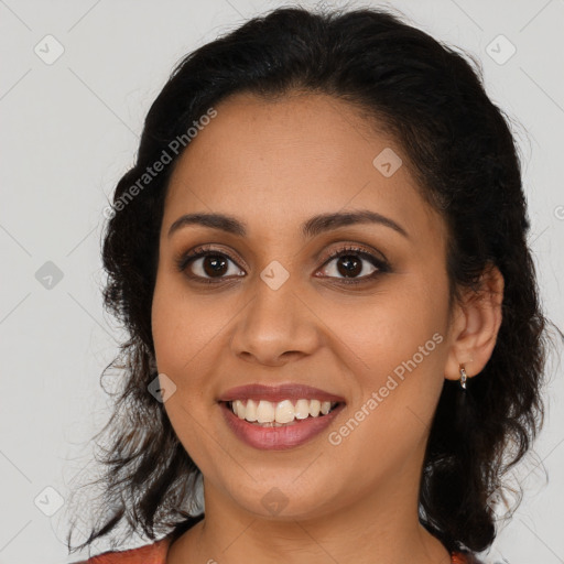 Joyful latino young-adult female with long  brown hair and brown eyes