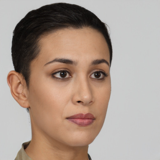 Neutral latino young-adult female with short  brown hair and brown eyes