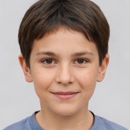 Joyful white child female with short  brown hair and brown eyes