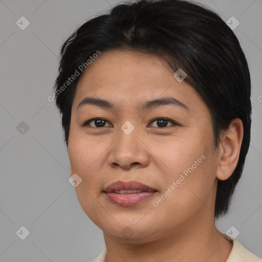 Joyful asian young-adult female with short  brown hair and brown eyes