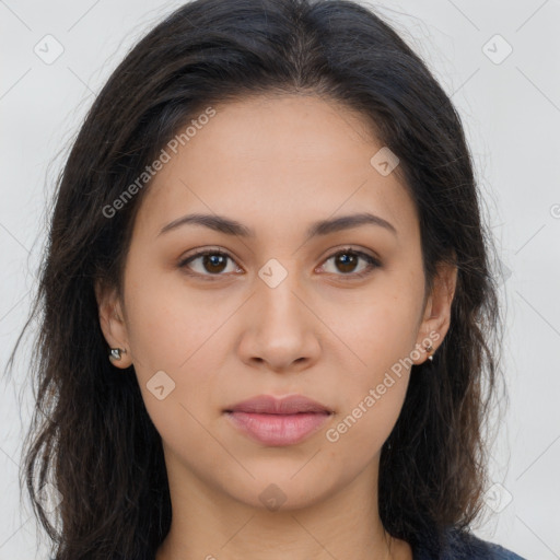 Joyful latino young-adult female with long  brown hair and brown eyes