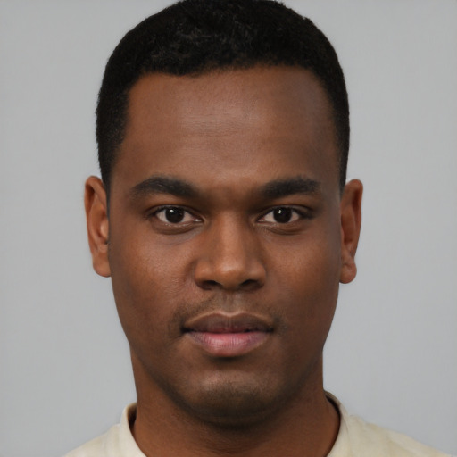 Neutral black young-adult male with short  black hair and brown eyes