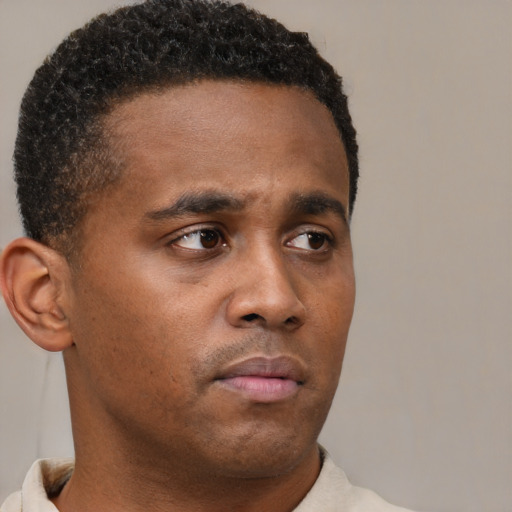Neutral black young-adult male with short  brown hair and brown eyes