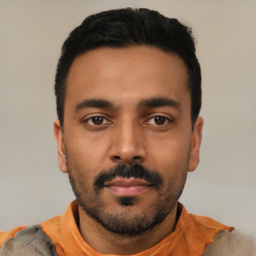 Neutral latino young-adult male with short  black hair and brown eyes