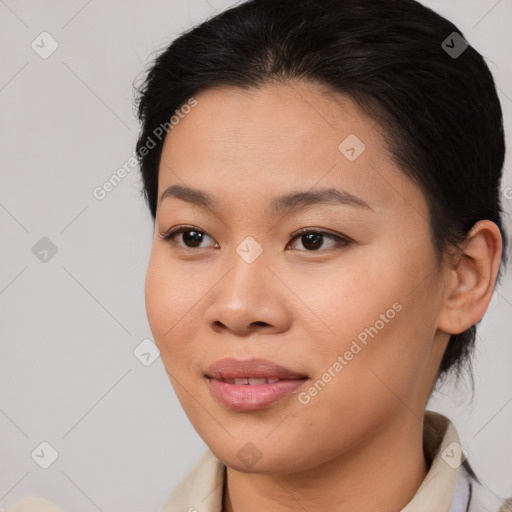 Joyful asian young-adult female with medium  brown hair and brown eyes