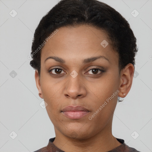 Neutral black young-adult female with short  black hair and brown eyes