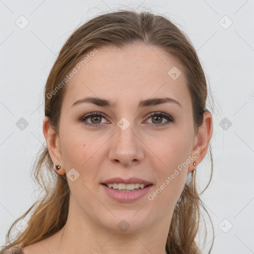 Joyful white young-adult female with long  brown hair and grey eyes