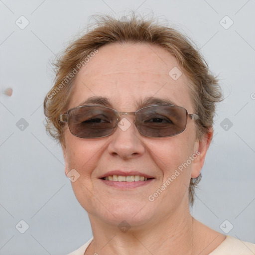 Joyful white adult female with short  brown hair and brown eyes