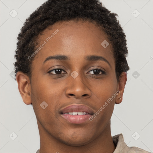 Joyful black young-adult female with short  brown hair and brown eyes