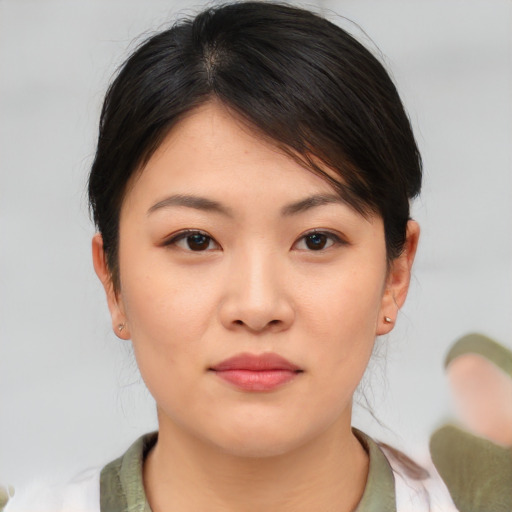 Neutral asian young-adult female with medium  brown hair and brown eyes