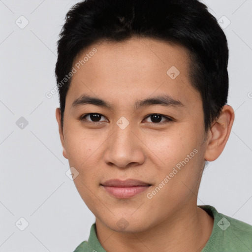 Joyful asian young-adult male with short  black hair and brown eyes