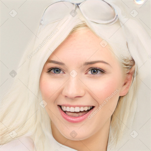 Joyful white young-adult female with medium  brown hair and blue eyes