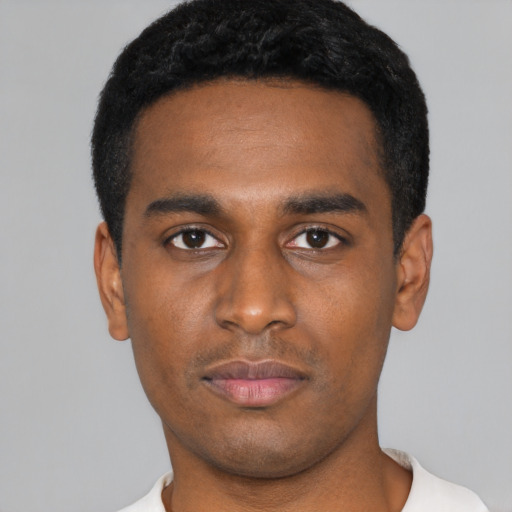 Neutral black young-adult male with short  black hair and brown eyes