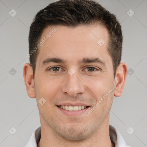 Joyful white young-adult male with short  brown hair and brown eyes