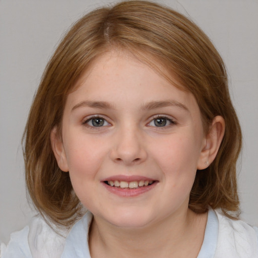 Joyful white child female with medium  brown hair and brown eyes