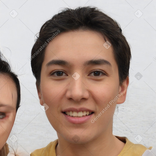 Joyful white young-adult female with short  brown hair and brown eyes