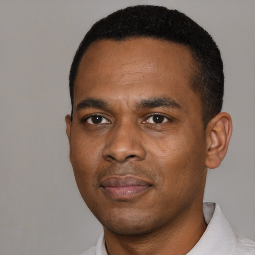 Neutral black young-adult male with short  black hair and brown eyes