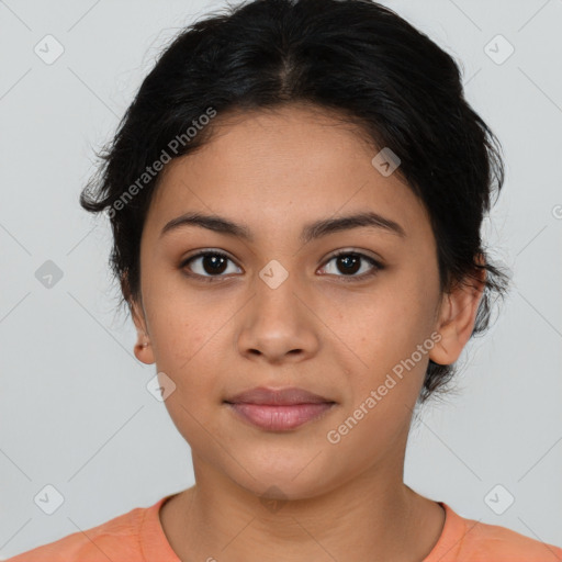 Joyful latino young-adult female with short  brown hair and brown eyes