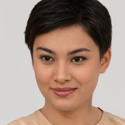 Joyful asian young-adult female with short  brown hair and brown eyes