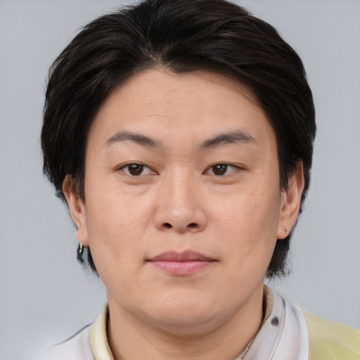 Neutral asian young-adult female with short  brown hair and brown eyes